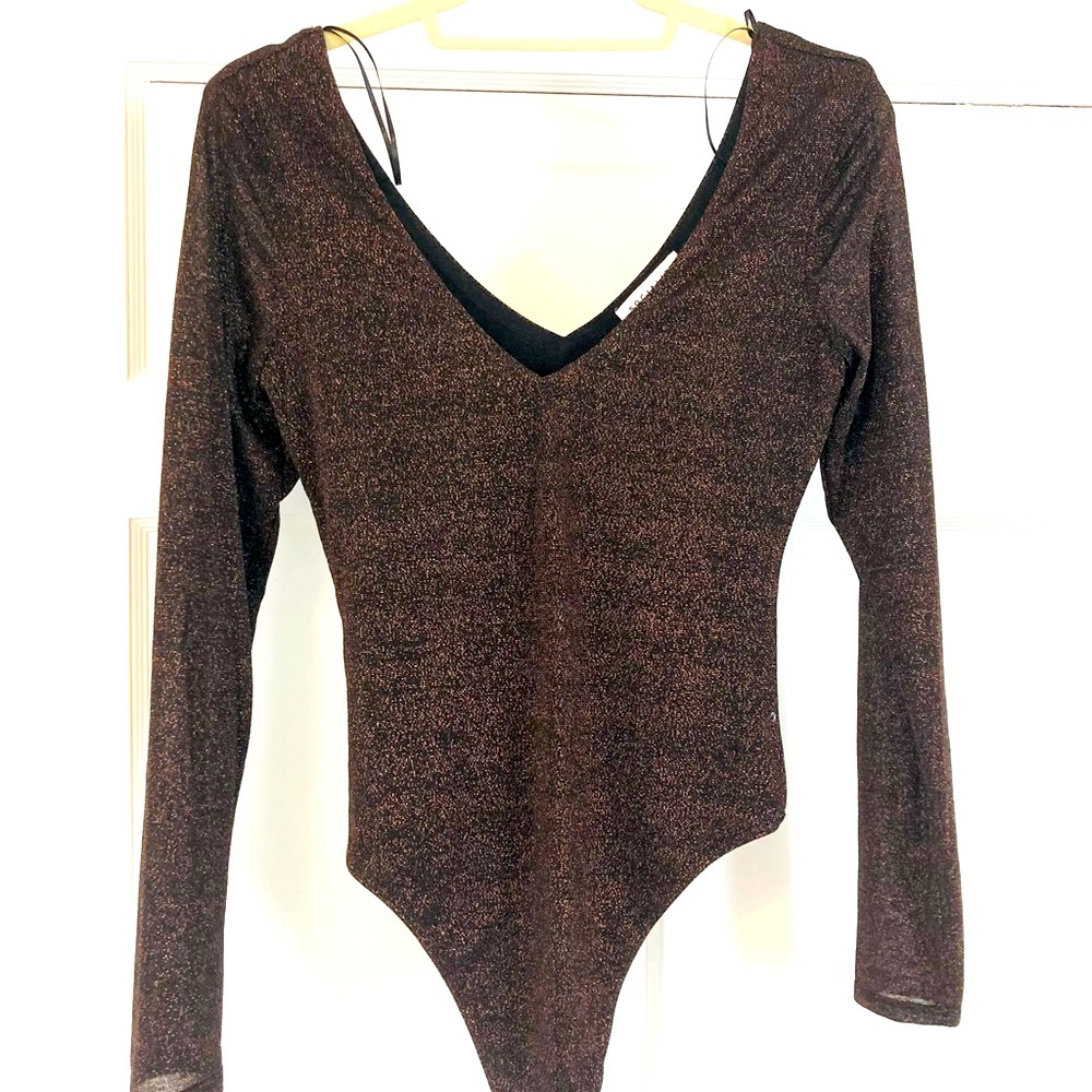Golden black bodysuit.